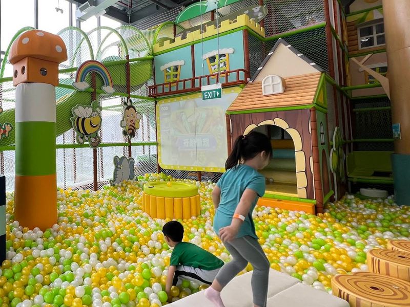 The Wan To Play indoor playground at i12 Katong, with a ball pit, a playhouse and climbing nets